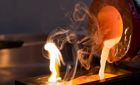 Image of liquid gold being poured