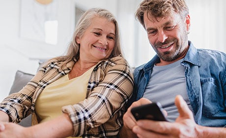 Couple looking at a phone