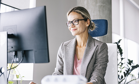 Woman on a computer in the office