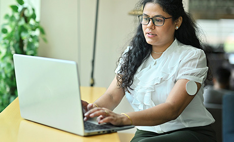 Woman using her laptop