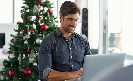A young man working on his laptop