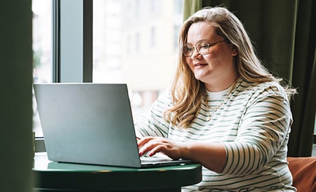 Lady using a laptop
