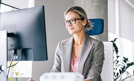 Woman on a computer in the office